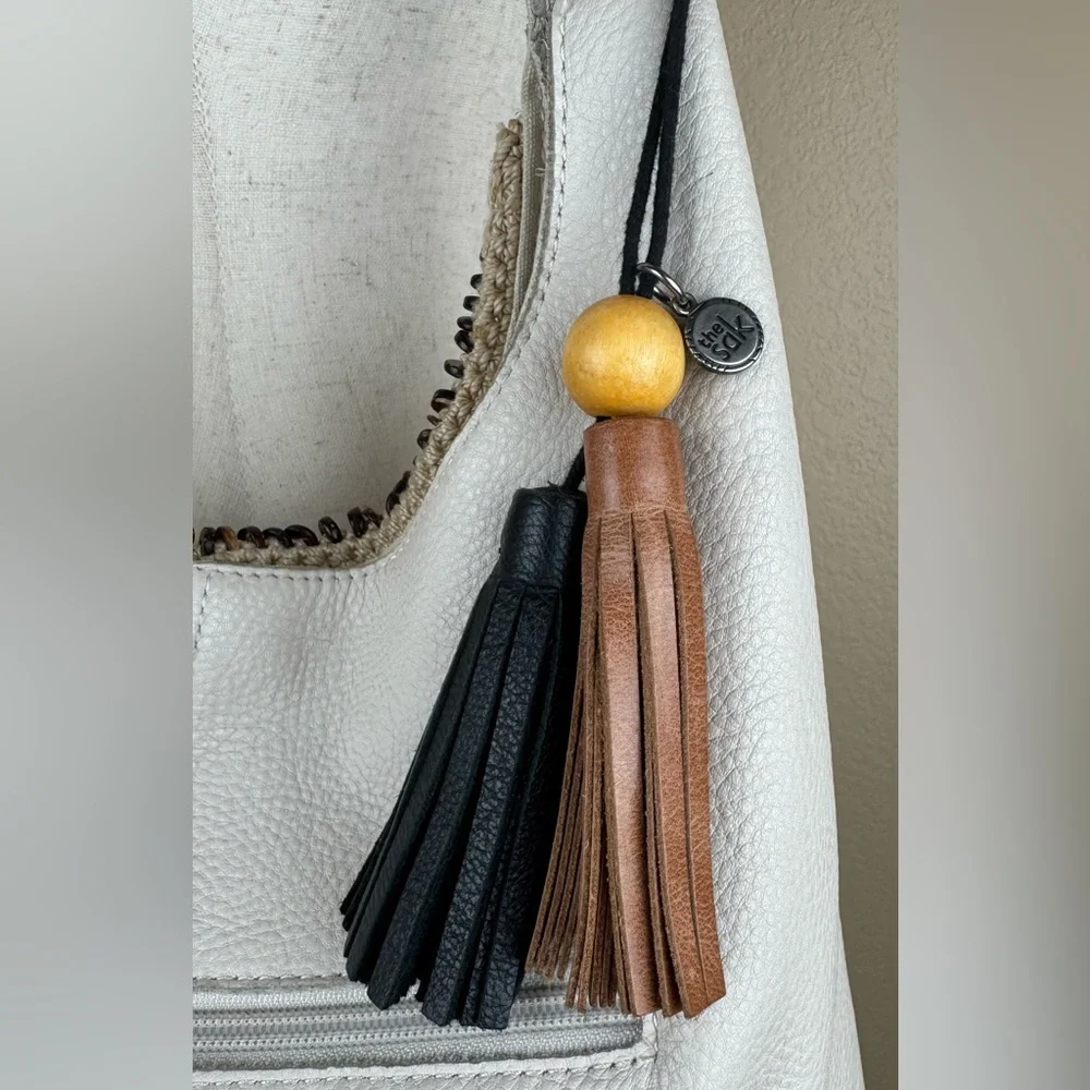 The Sak Huntley Hobo Bag. Ecru.Soft, Pebbled Leather w/Fabric Turquoise Interior - Picture 7 of 16